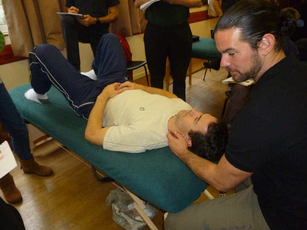Andy Gamble providing sports injury therapy